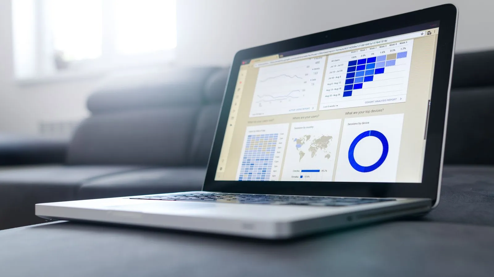 Analytics dashboard showing organic search performance data on a laptop screen