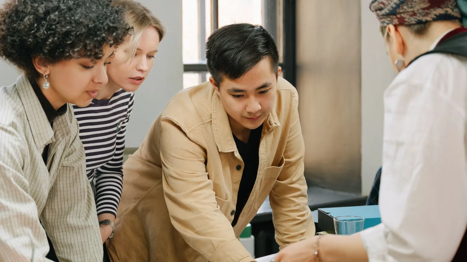 A strategy session between a consultant and a client marketing team